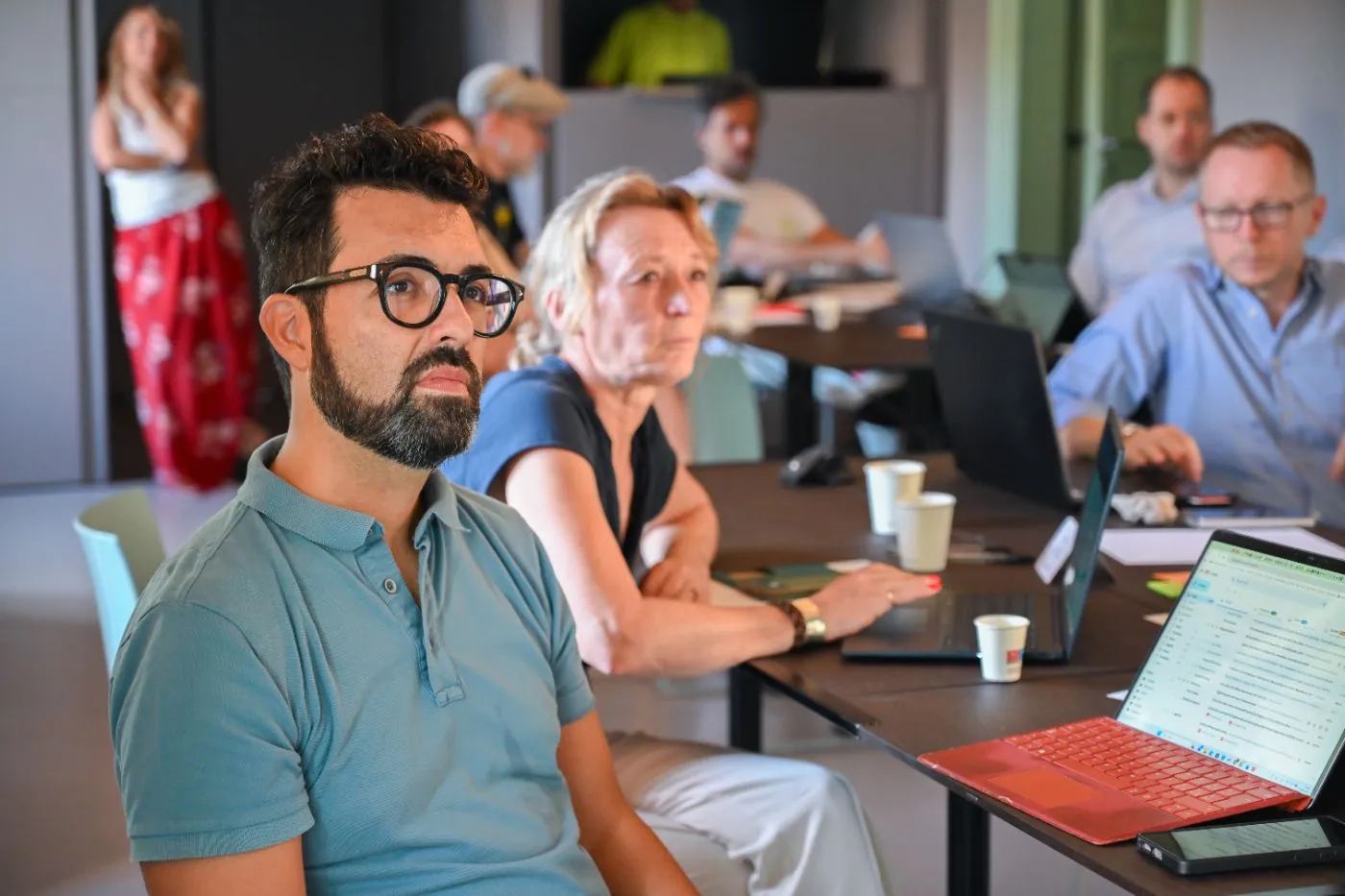 Participants listening during a bootcamp session
